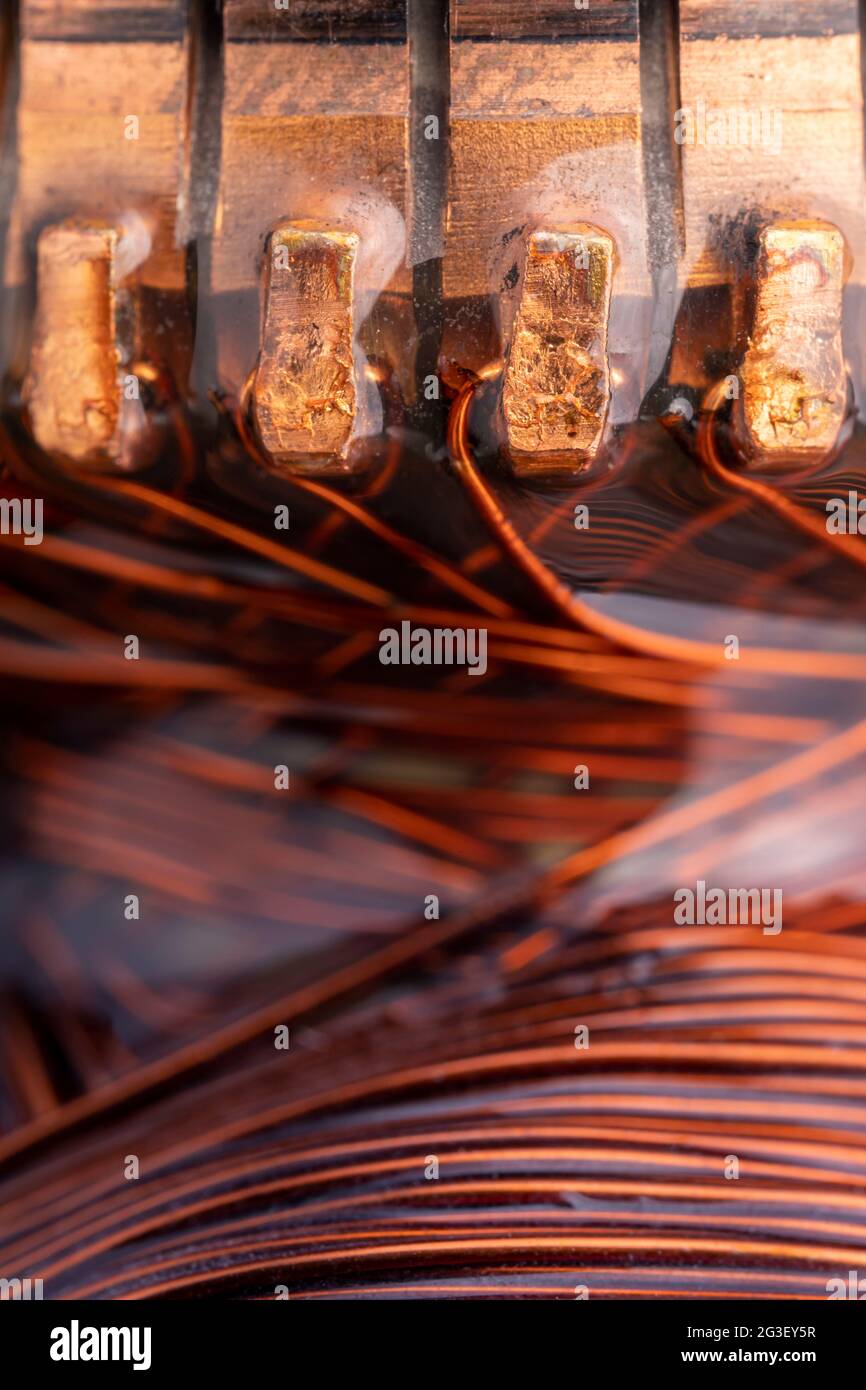 Copper commutator bar of the electric motor close up. Electric motor