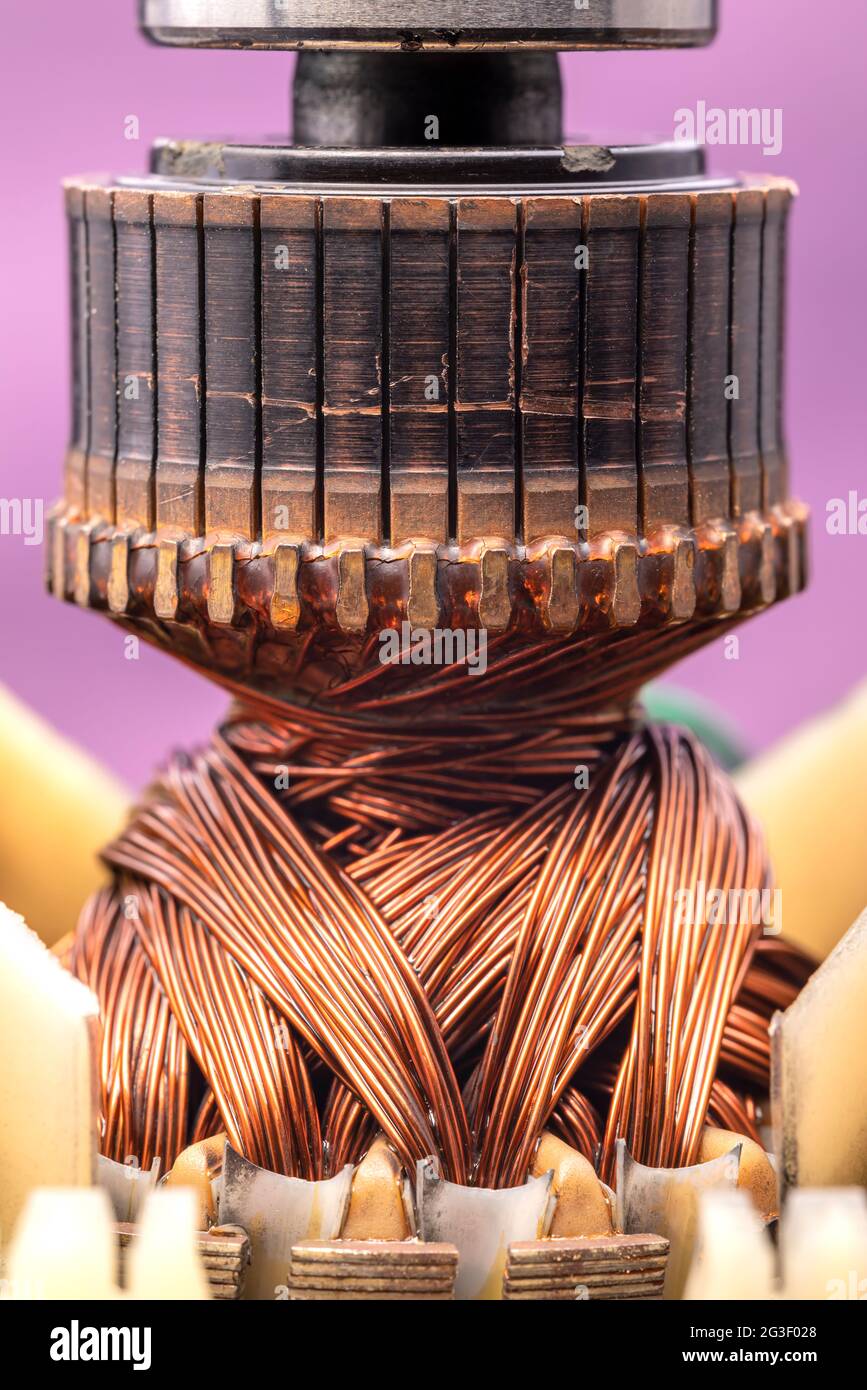 Copper commutator bar of the electric motor close up. Electric motor