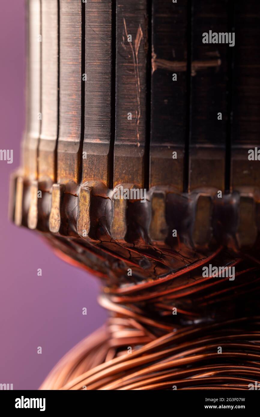 Copper commutator bar of the electric motor close up. Electric motor