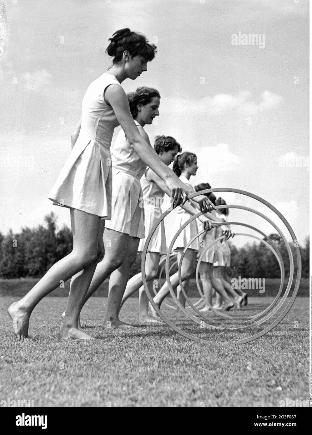 sports, gymnastics tournament, Gymnaestrada, Stuttgart, 1961, hoop gymnastics, ADDITIONAL-RIGHTS-CLEARANCE-INFO-NOT-AVAILABLE Stock Photo