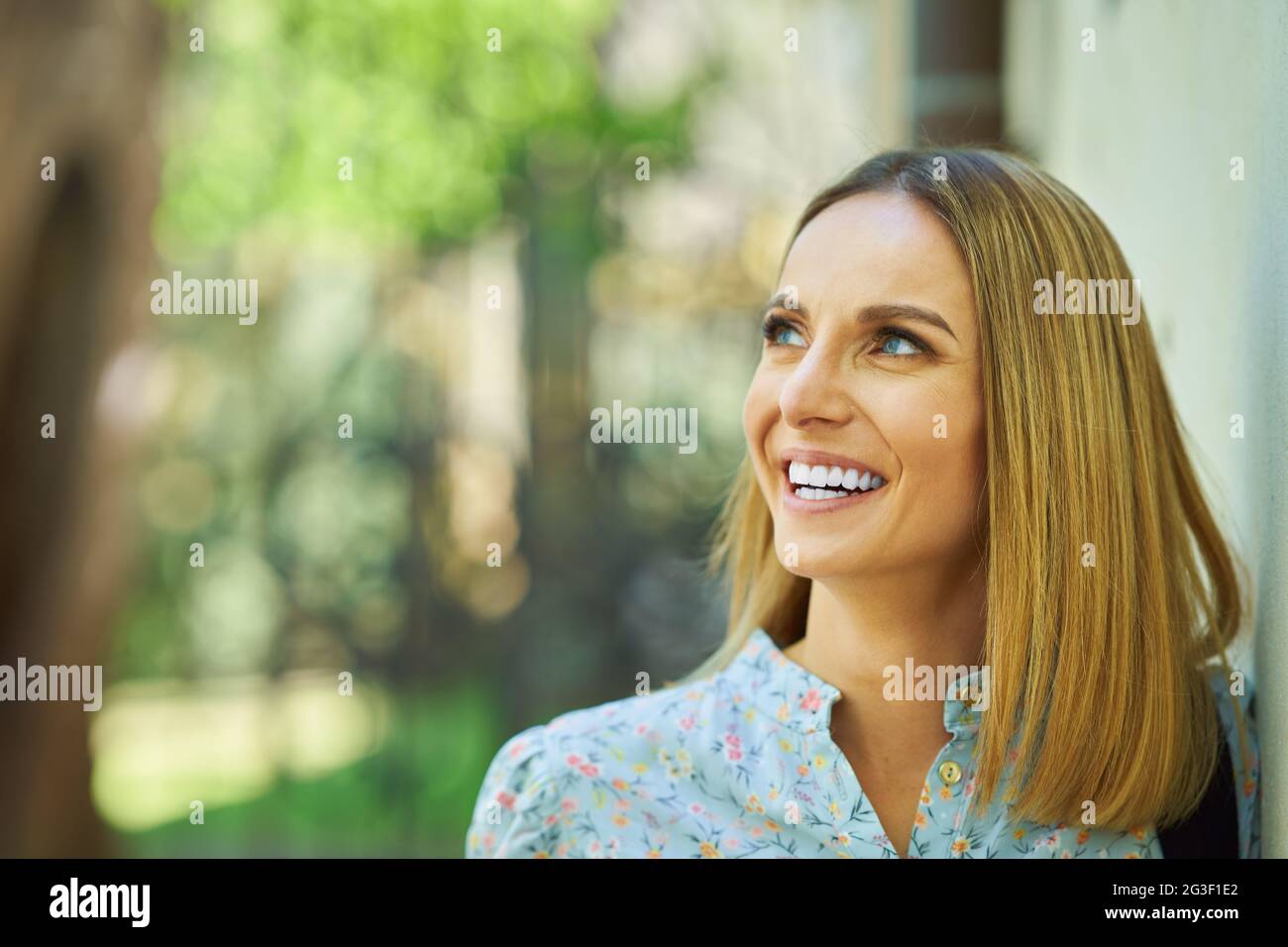 A nice and happy girl with smarfone Stock Photo