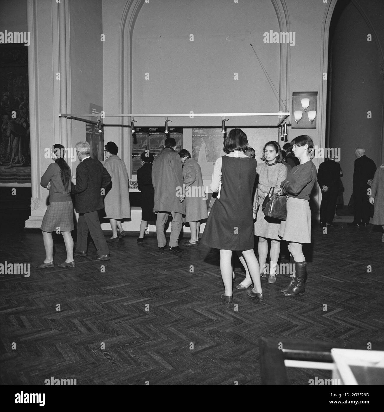 Visitors at the public desk in the front hall; Exhibition Frescoes from ...