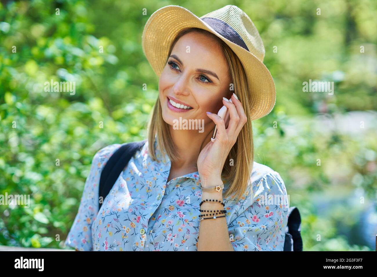 A nice and happy girl with smarfone Stock Photo