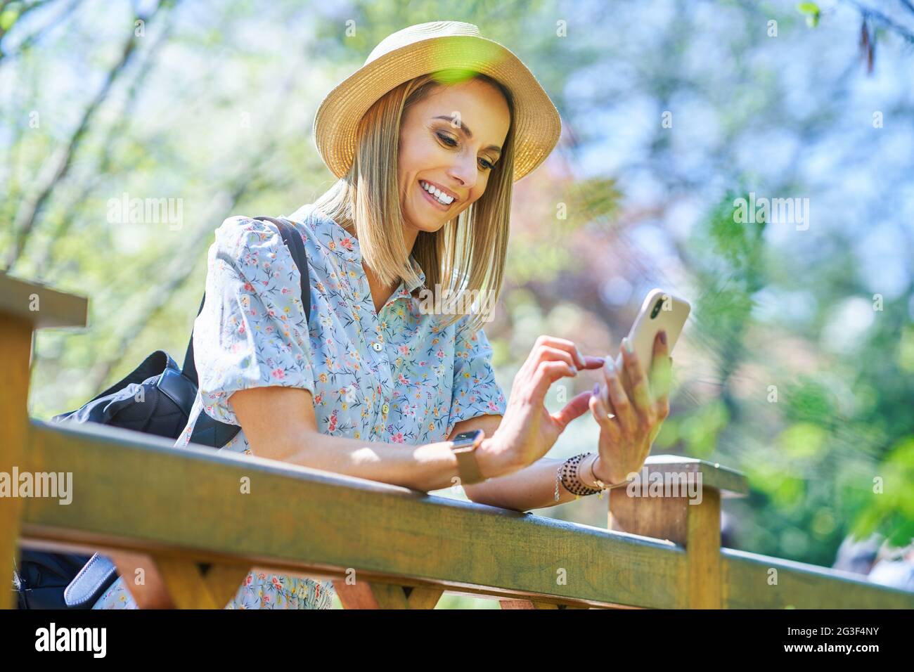 A nice and happy girl with smarfone Stock Photo
