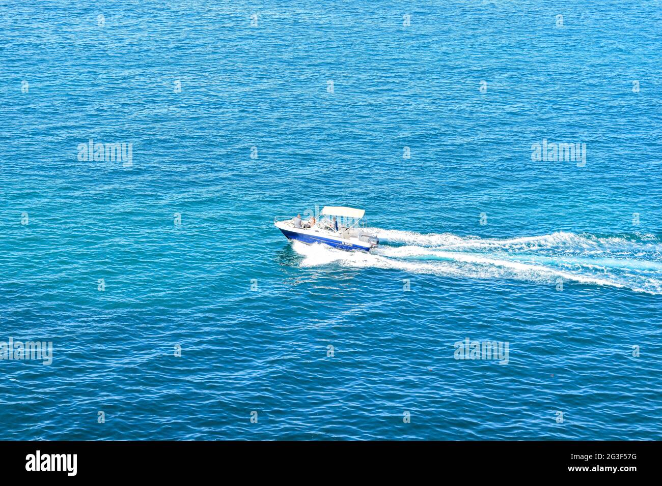 Aerial view of speed motorboat on open Mediterranean sea in Tipaza ...