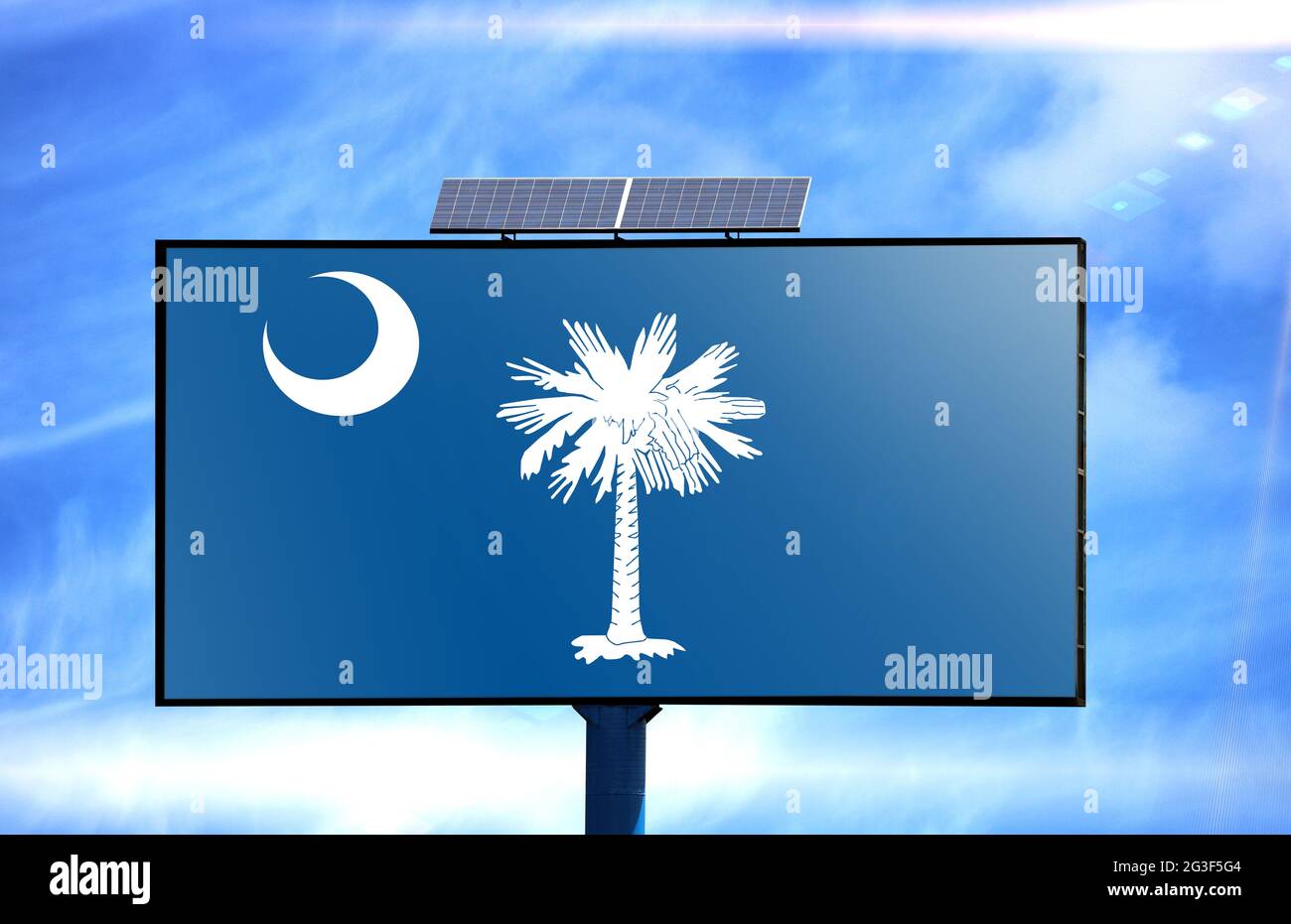 Billboard with State of South Carolina flag and solar battery on blue ...