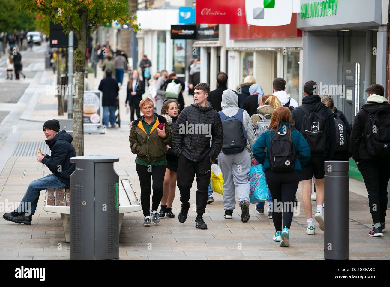 People in the city centre of Preston. Preston is a city in Lancashire in the north of England which like most areas in the north west of England is su Stock Photo