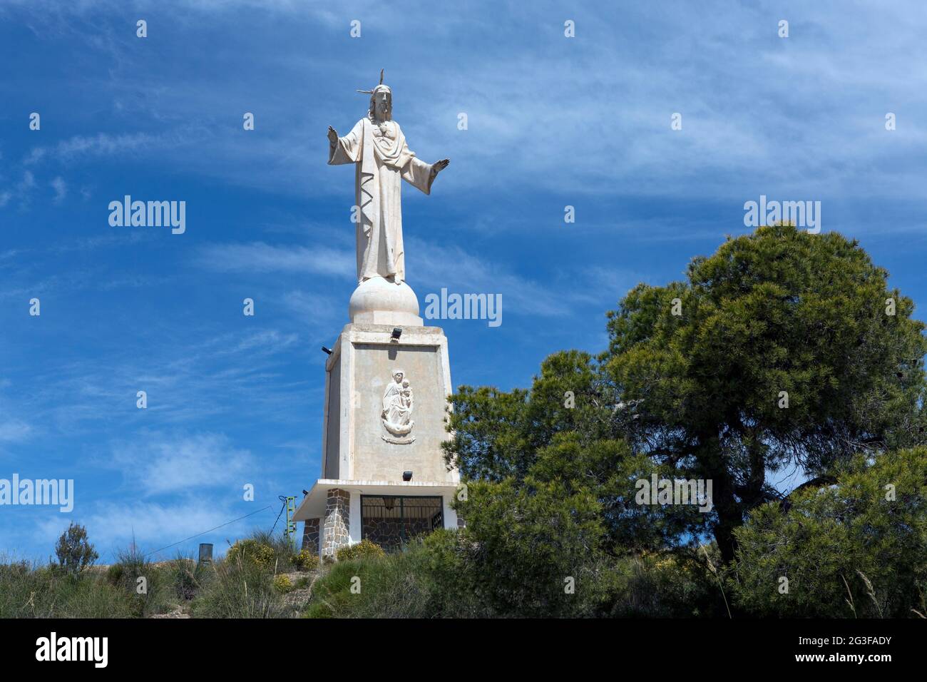Side view of the grandiose construction of the sculpture of the Sacred Heart of Jesus located on the balcony of the municipality of Totana, Murcia, Sp Stock Photo
