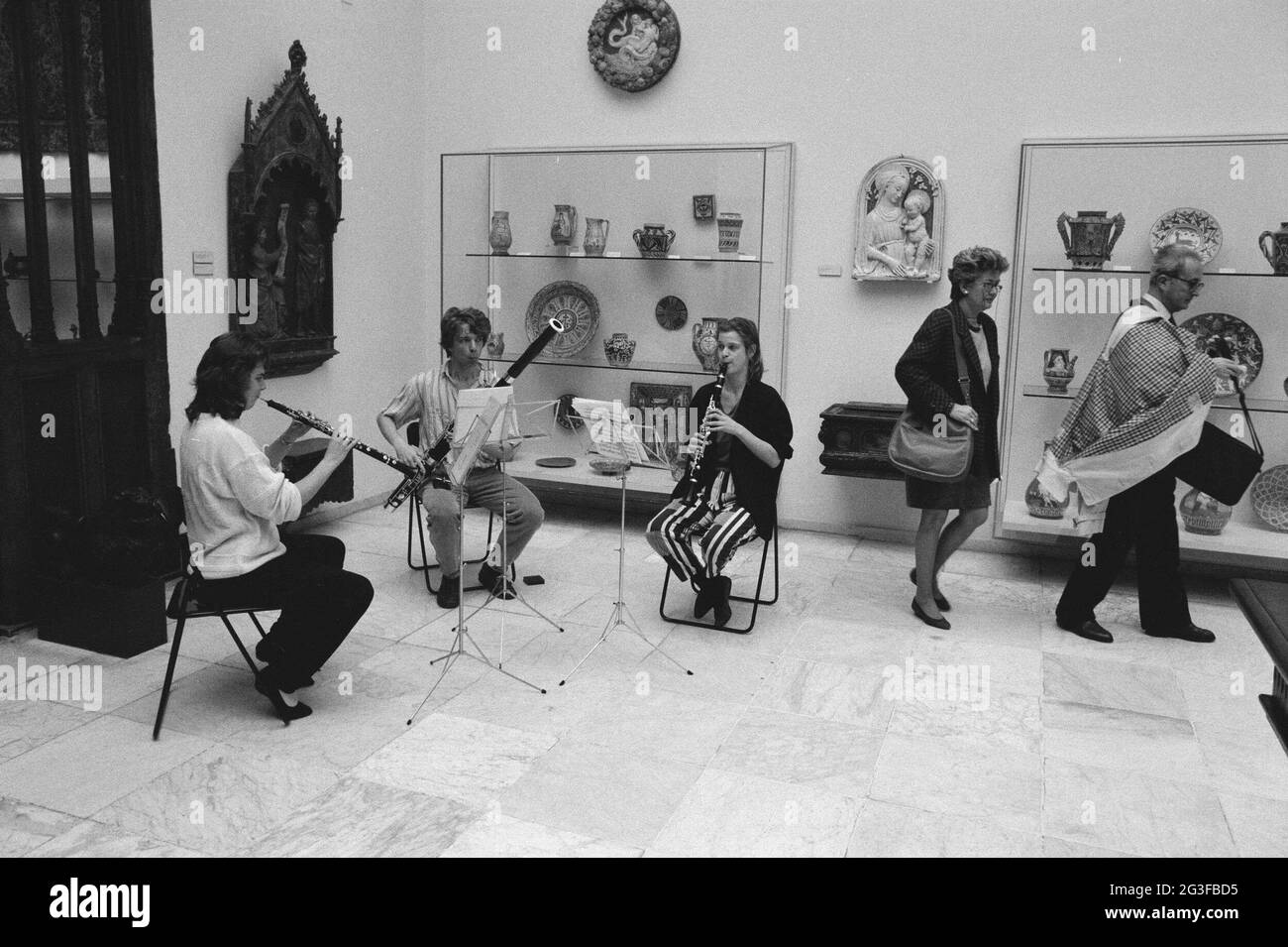Musicians walking with instruments Black and White Stock Photos ...