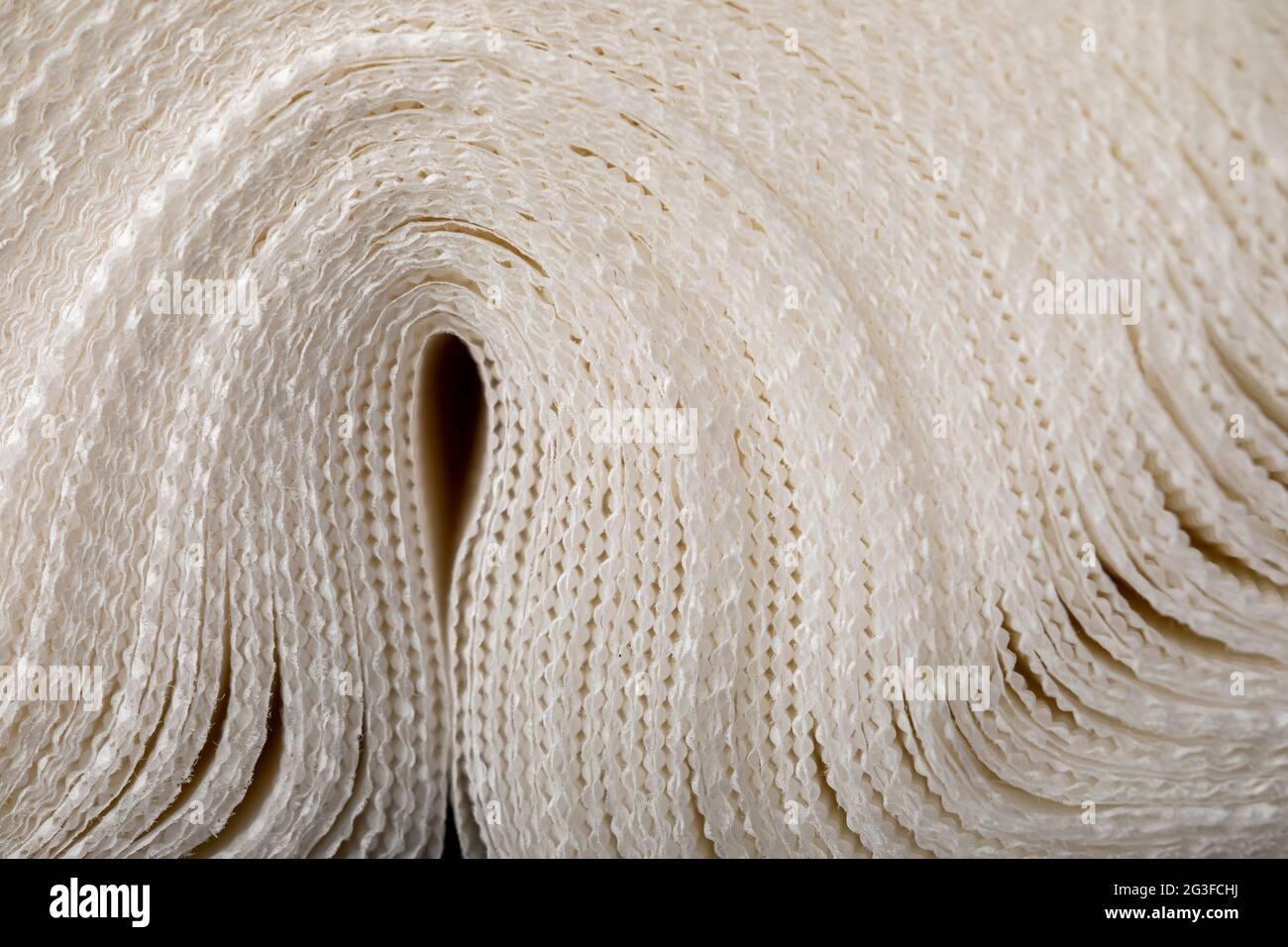 Disposable paper table napkins close up. White paper napkins Stock