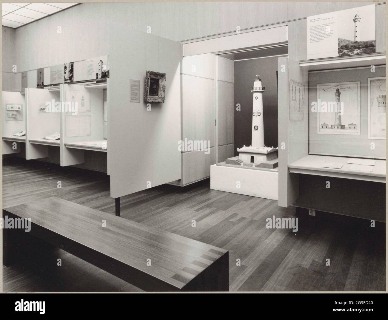 Room with images of lighthouses and in the middle a model of a ...
