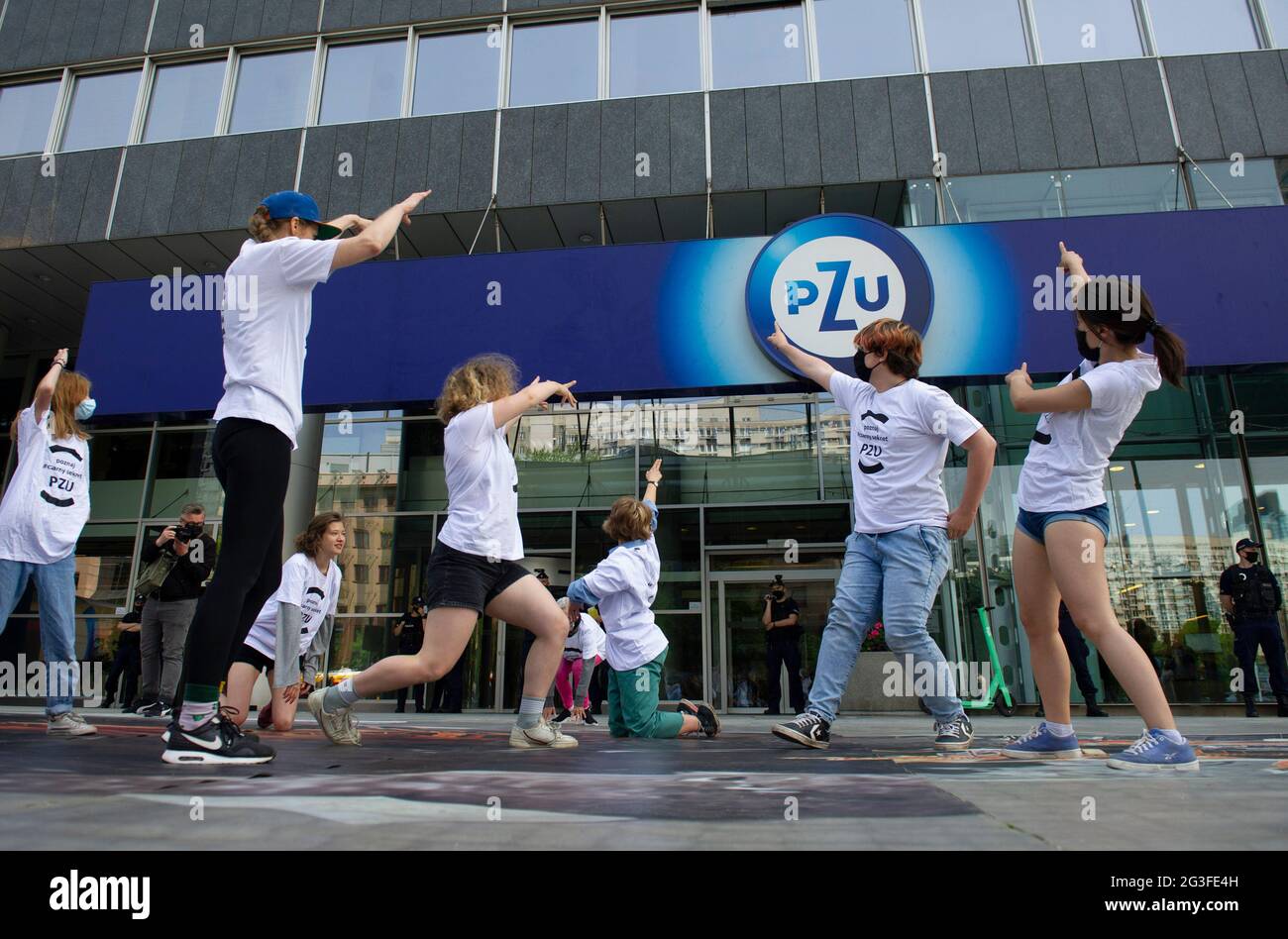 June 16, 2021, Warsaw, Warsaw, Poland: Extinction Rebellion activists perform during a protest next to the PZU insurance headquarter on June 16, 2021 in Warsaw, Poland. A few dozens of members of the environmental movement Extinction Rebellion Polska (XR) gathered next to the headquarter of the biggest Polish insurance group PZU to demand immediate pull out of PZU's from all coal investments and to adopt a new strategy based on scientific knowledge to tackle climate change according to the European Union climate goals and Poland's obbligations towards the Paris Agreement. (Credit Image: © Ale Stock Photo