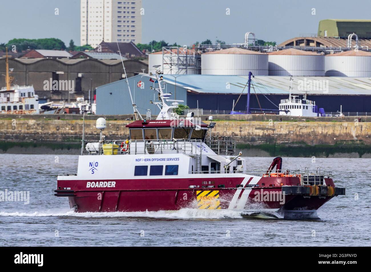 Northern Offshore Services launch named Boarder speeding along the river Mersey. Stock Photo