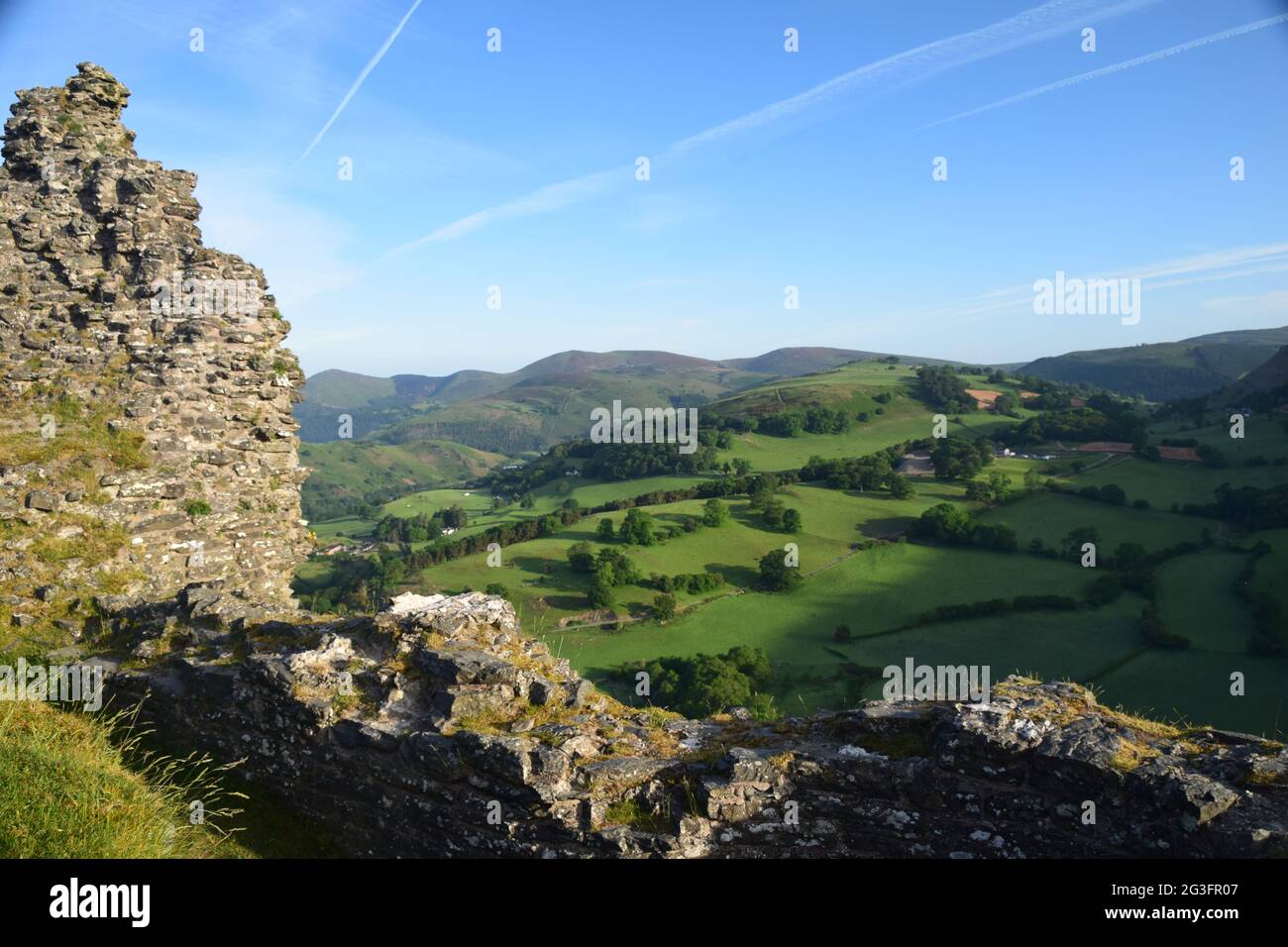 Castell Dinas Bran circa 1260, on the site of a bronze age hillfort over looking Llangollen with views over the Berwyn and Clwydian ranges in summer. Stock Photo