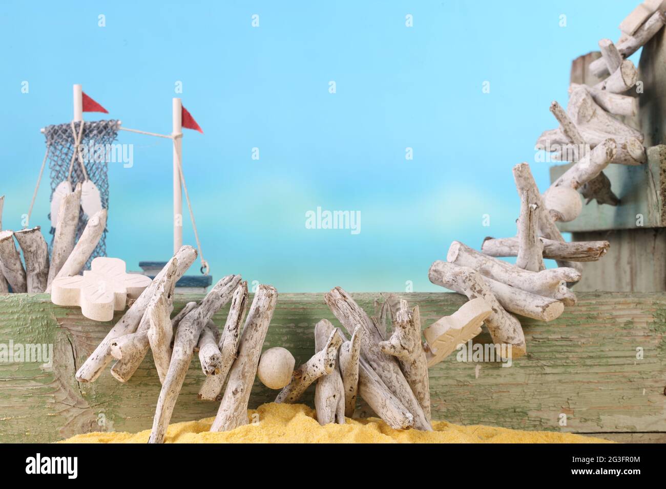 Beach with wooden planks and flotsam Stock Photo