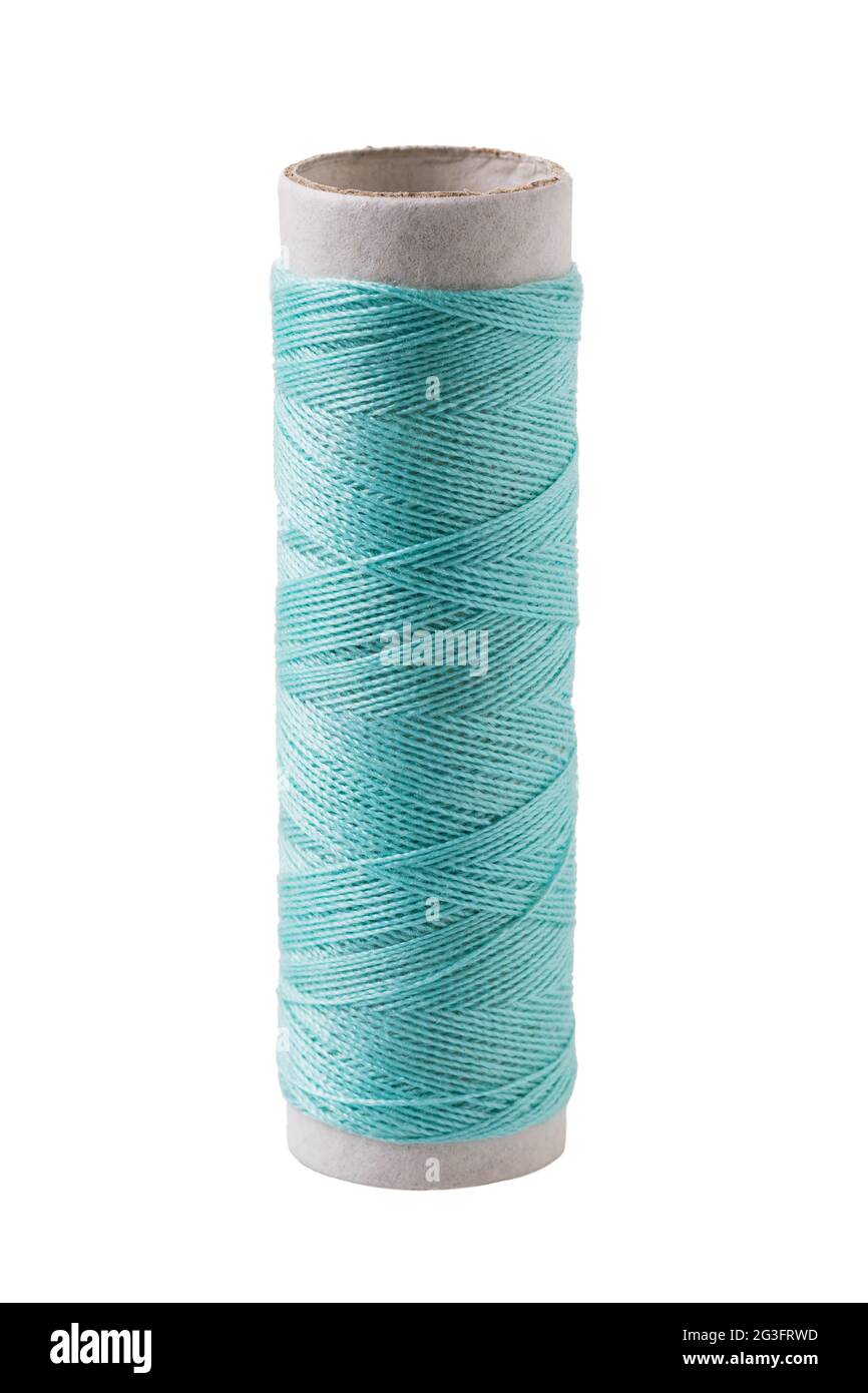 One spool of emerald threads isolated on white background Stock Photo