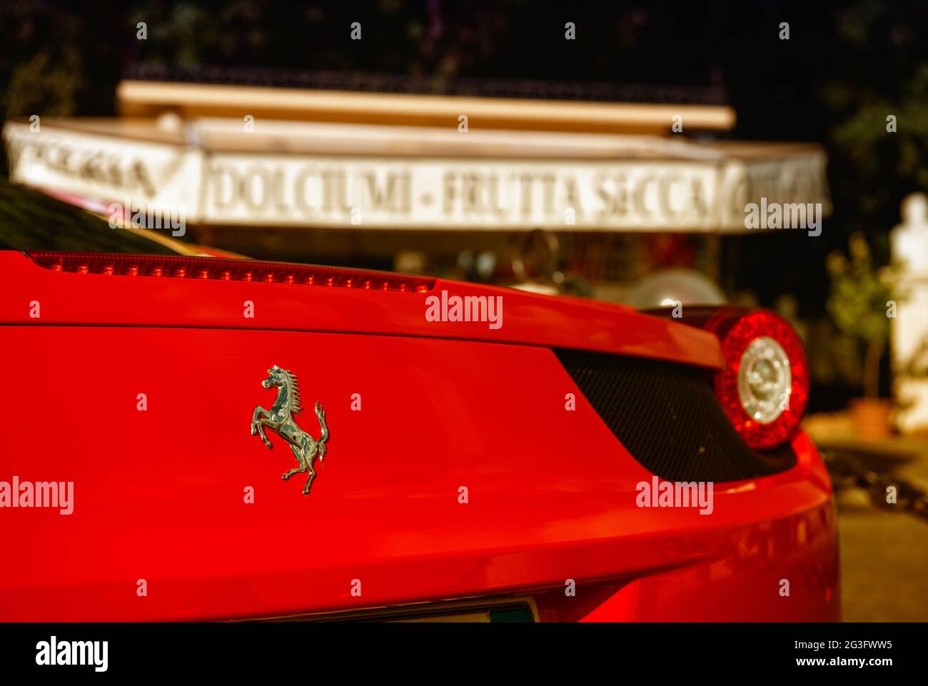 ROME - NOV 1: Red Ferrari shines at Gianicolo, November 1, 2012 in Rome. Ferrari has been noted for its continued participation Stock Photo