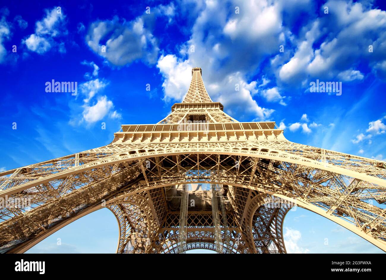 Paris. Powerful structure of Magnificent Eiffel Tower at sunset Stock Photo