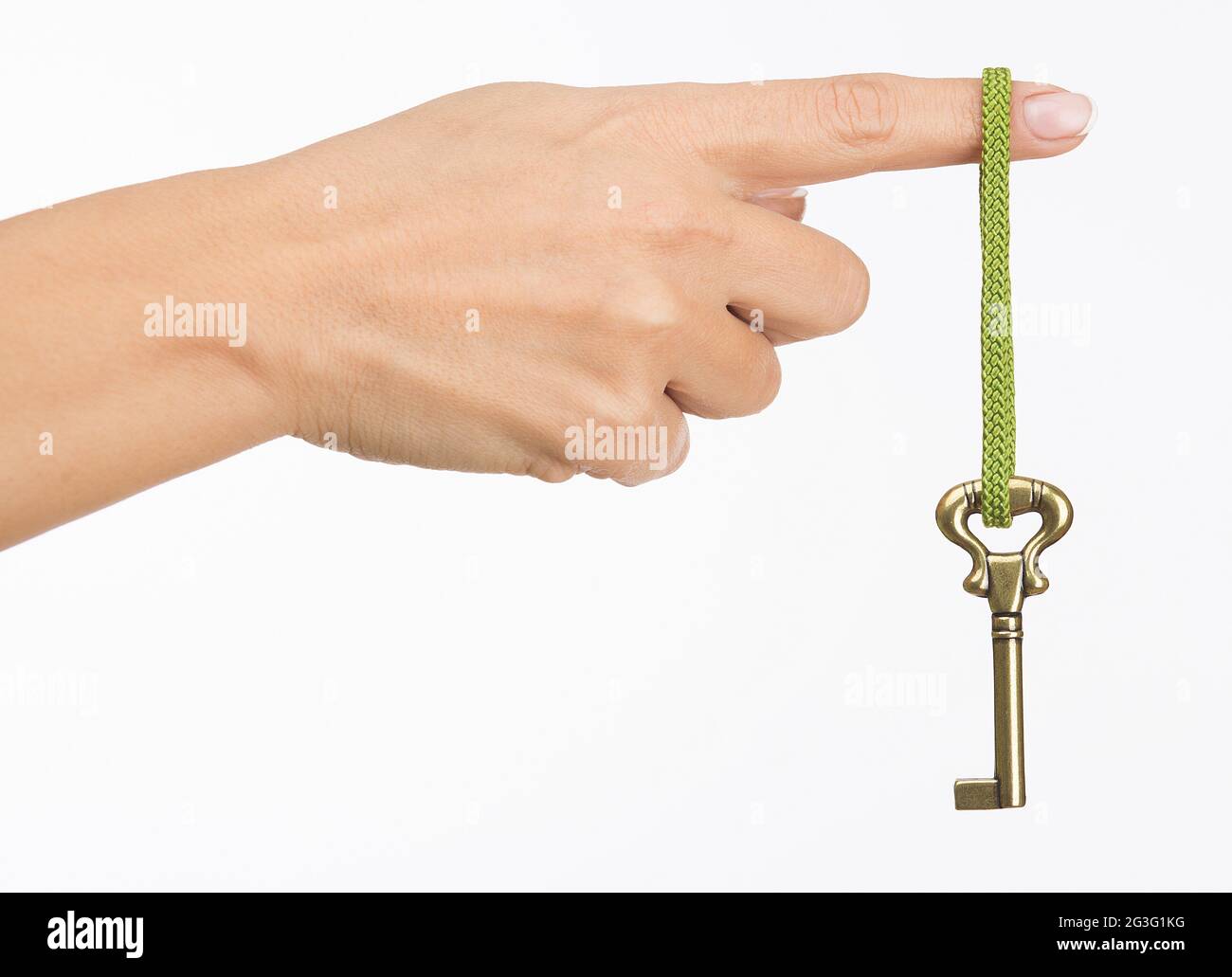 Hand with old key Stock Photo