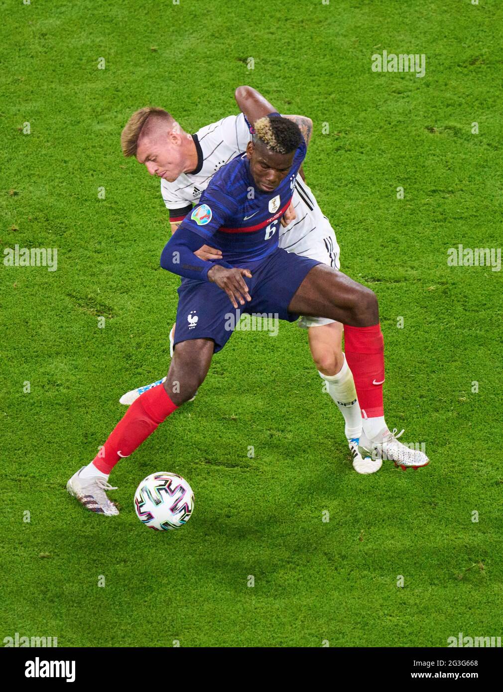 Toni Kroos, DFB 8  compete for the ball, tackling, duel, header, zweikampf, action, fight against Paul POGBA, FRA 6  in the Group F match FRANCE - GERMANY  1-0 at the football UEFA European Championships 2020 in Season 2020/2021 on June 15, 2021  in Munich, Germany. © Peter Schatz / Alamy Live News Stock Photo