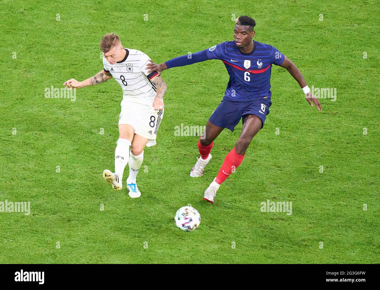 Toni Kroos, DFB 8  compete for the ball, tackling, duel, header, zweikampf, action, fight against Paul POGBA, FRA 6  in the Group F match FRANCE - GERMANY  1-0 at the football UEFA European Championships 2020 in Season 2020/2021 on June 15, 2021  in Munich, Germany. © Peter Schatz / Alamy Live News Stock Photo
