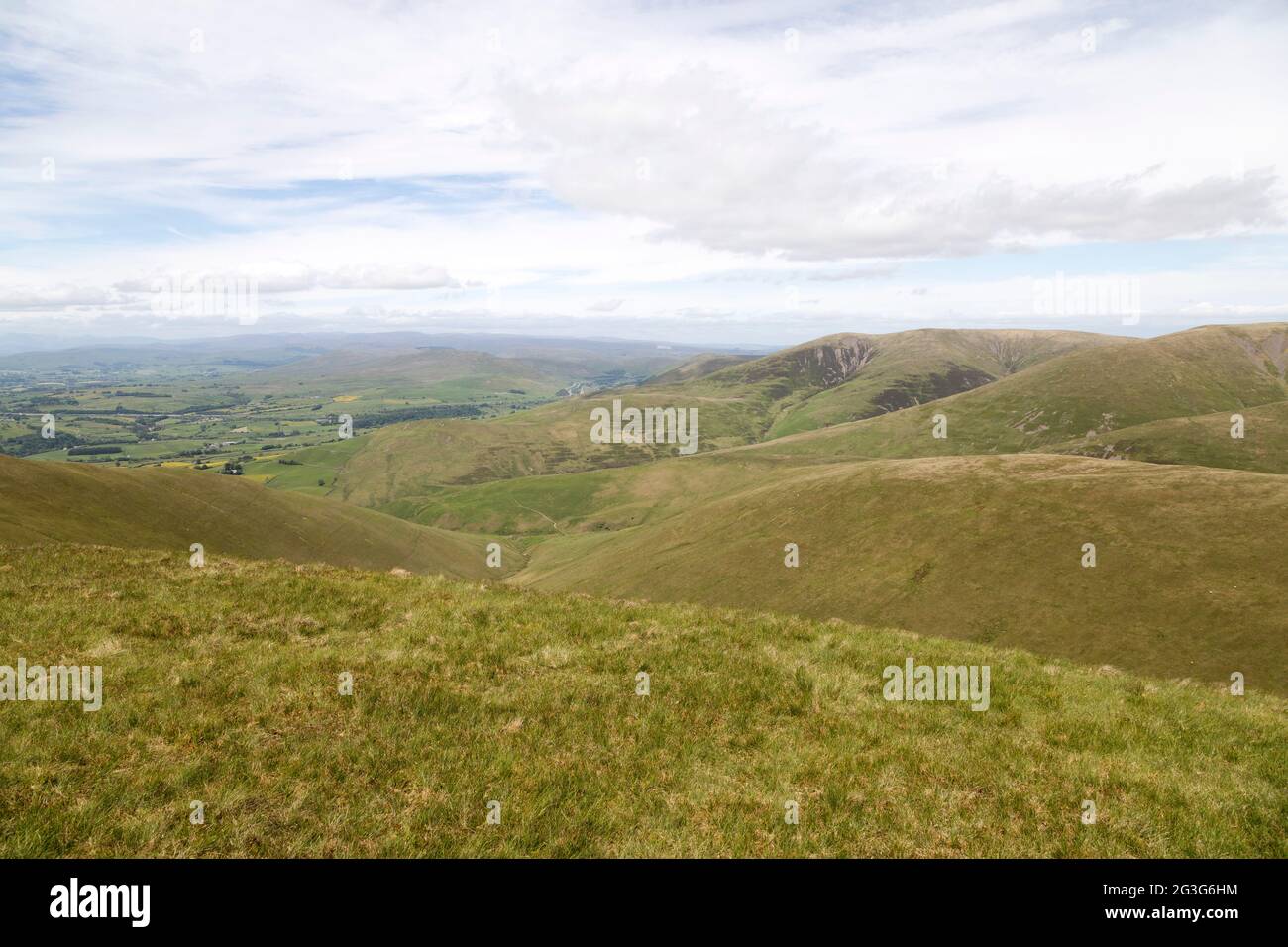 View from Arant Haw in the Yorkshire Dales National Park. The countryside is green and rolling. Stock Photo