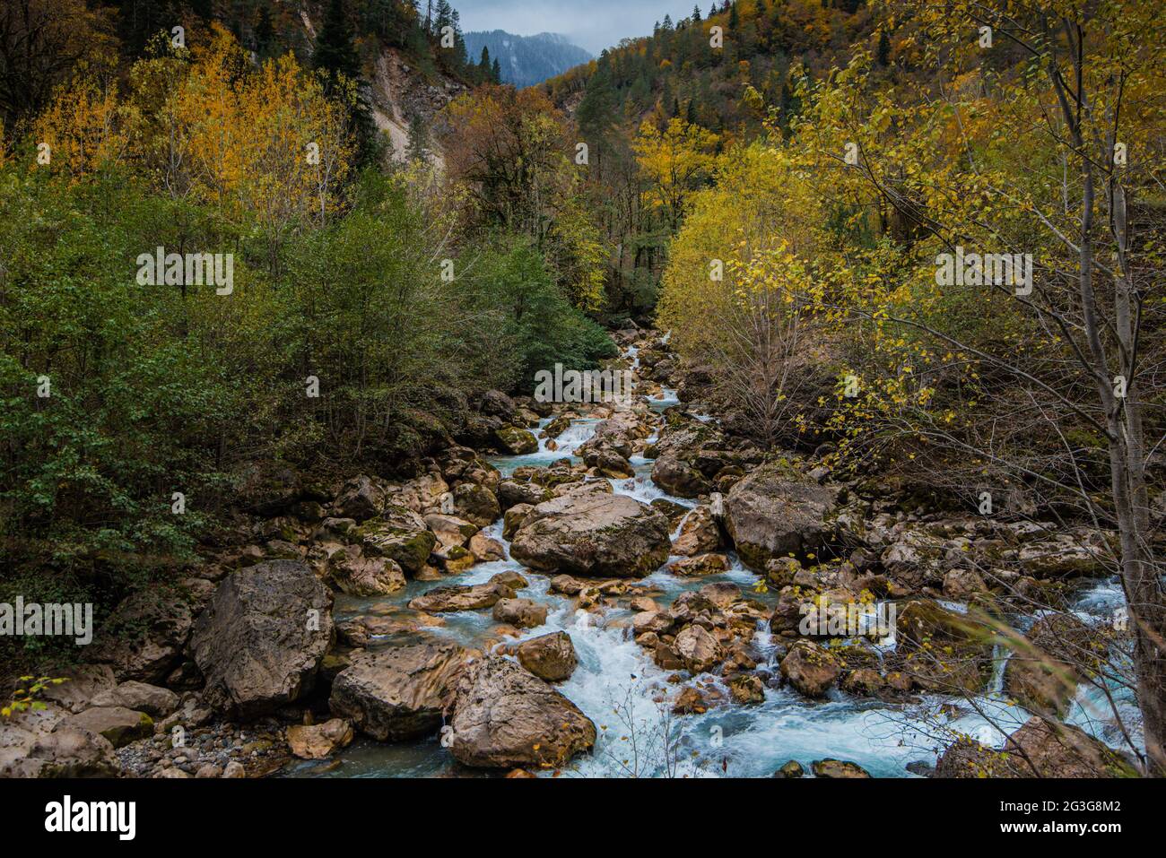 mountain river autumn-winter time period. cloudy weather overcast. landscape. Stock Photo