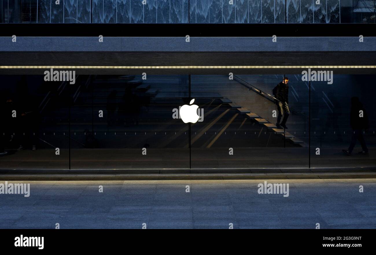 Apple store entrance gate, with the fountain cube glass, in Liberty square, in Milan. Stock Photo