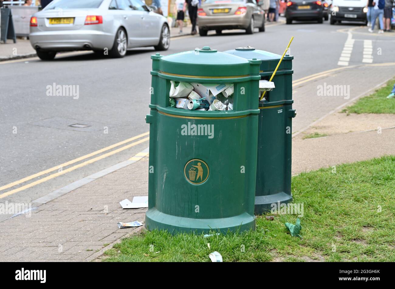 Overflowing rubbish bins in the Cotswolds town of Bourton on the Water