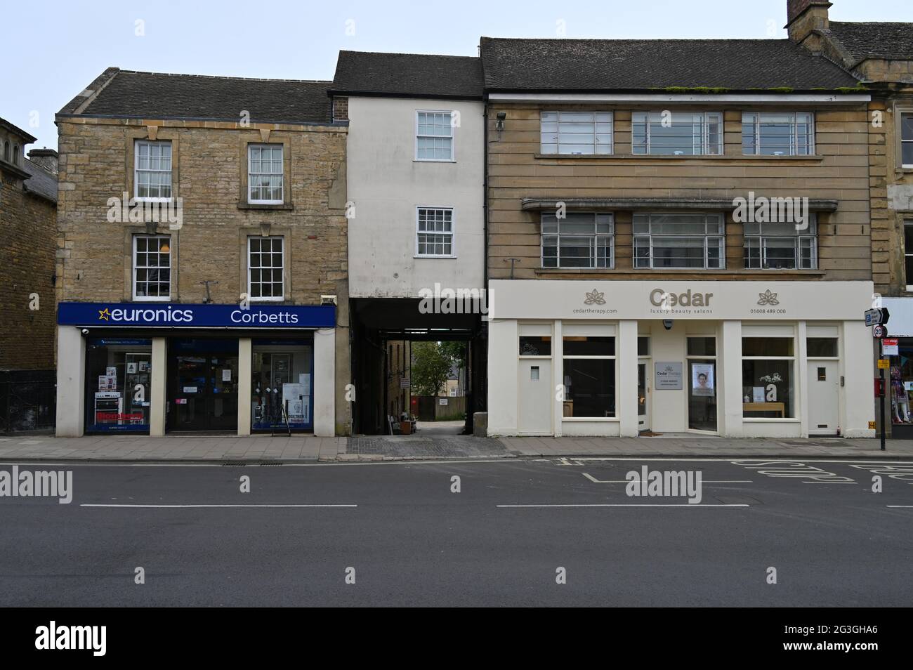 Shops in the north Oxfordshire town of Chipping Norton with a view of