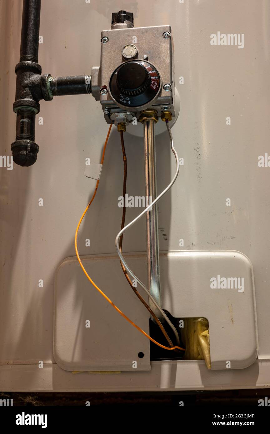 Focus on heating controls of a hot water heater with base plate on and