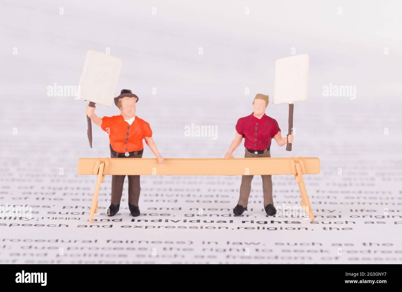 Tiny persons demonstrating for their rights Stock Photo - Alamy