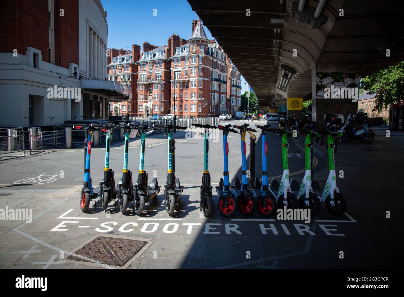An e-scooter station in Hammersmith - one of the few boroughs where from Monday 7 June 2021 electric scooters became available to rent in London. Stock Photo