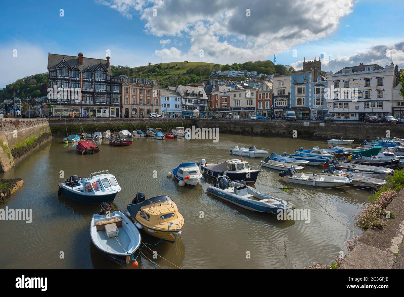 Dartmouth Harbour UK, view in summer of the south west corner of Dartmouth harbour showing quayside shops and period architecture, Devon, England Stock Photo