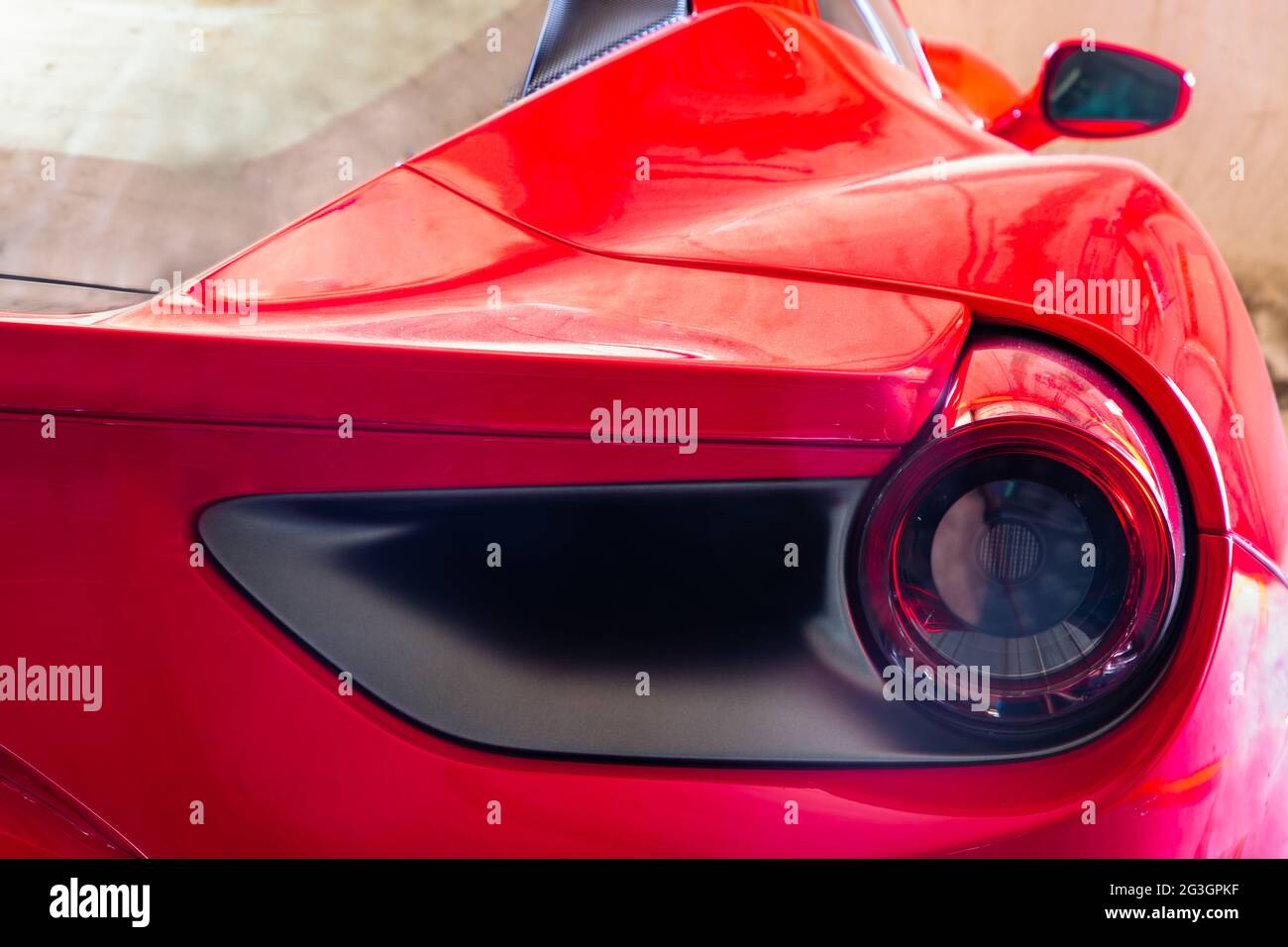 Bangkok, Thailand - 06 Jun 2021 : Close-up of Rear light or Tail lamp and view mirror of Red ferrari car. Ferrari is Italian sports car. Selectiv Stock Photo - Alamy