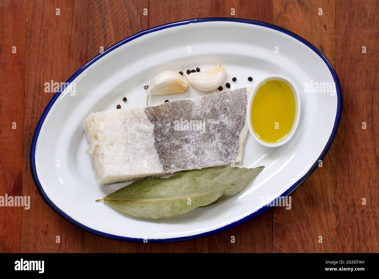 salted codfish with oil Stock Photo Alamy