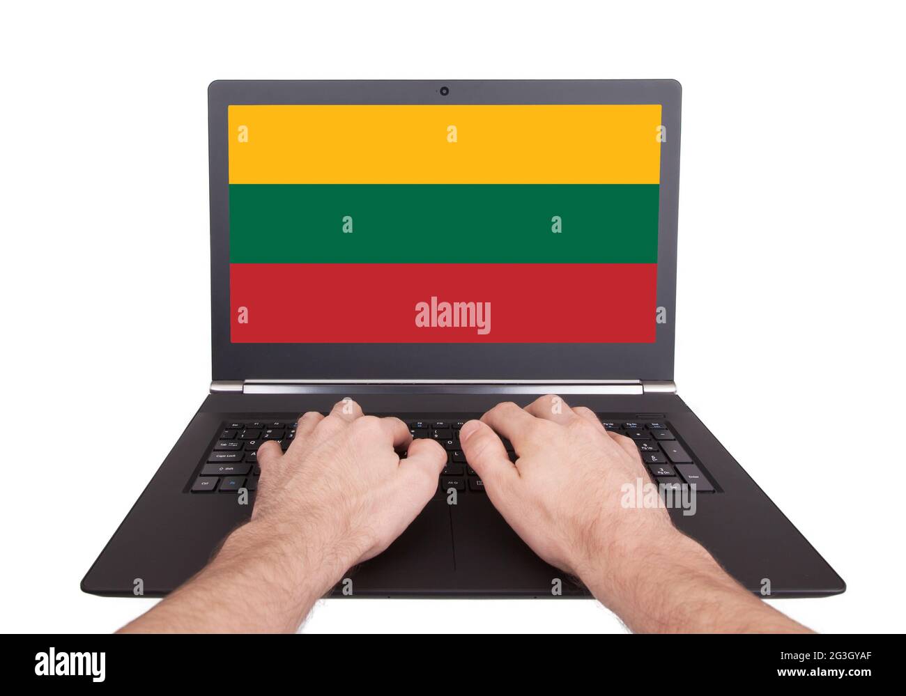Hands working on laptop, Lithuania Stock Photo
