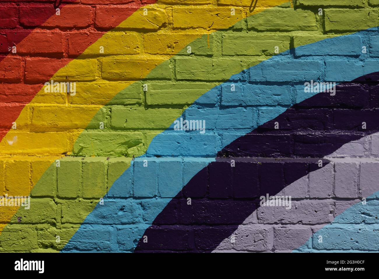 Colours representing a rainbow are seen on a wall in England, UK Stock ...