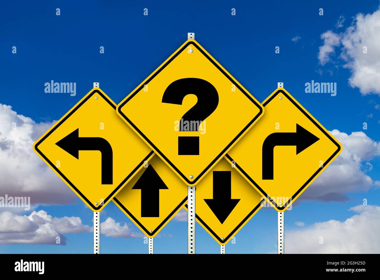 Caution yellow road signs with question mark and arrows with a blue sky