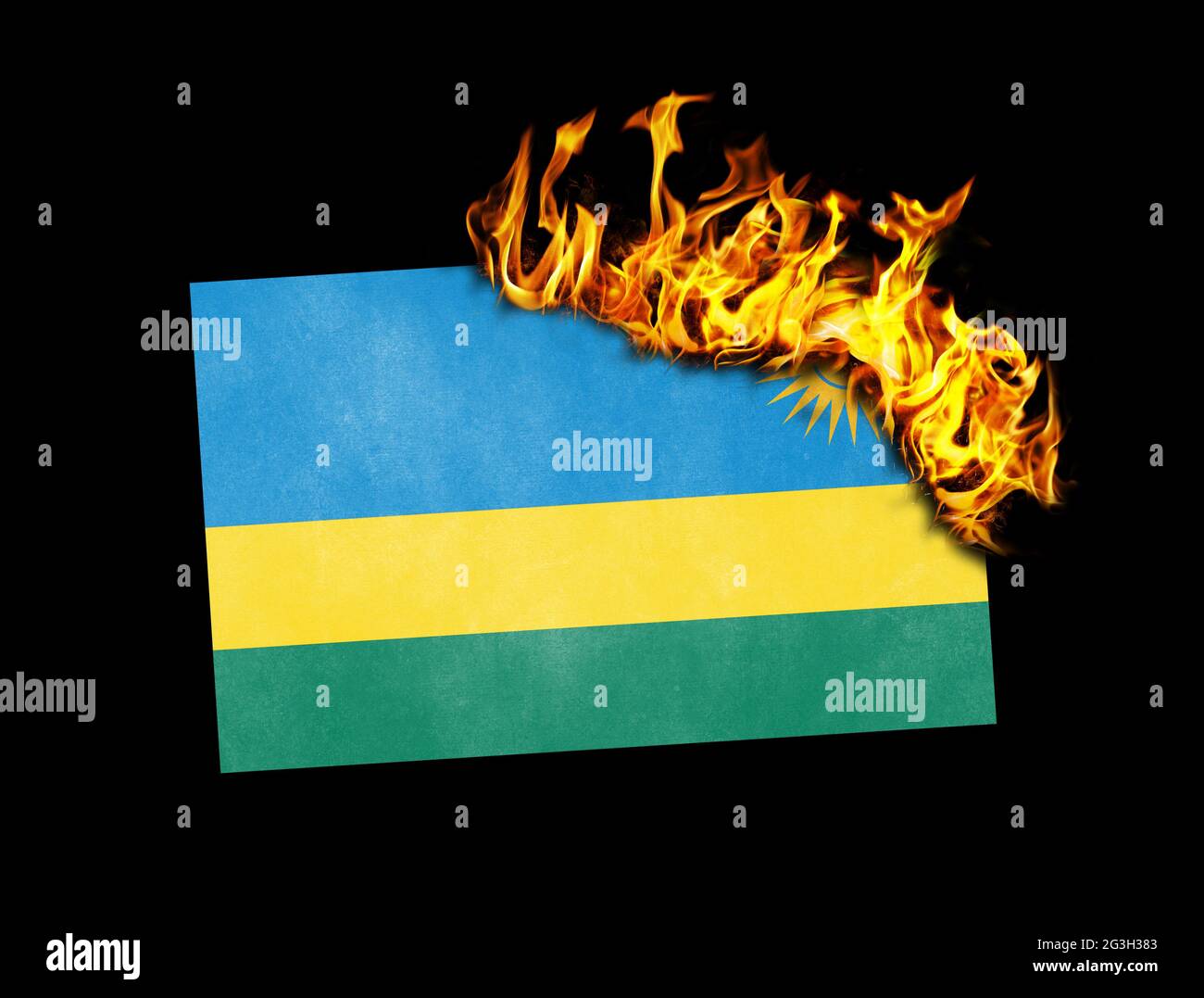 Flag burning - Rwanda Stock Photo