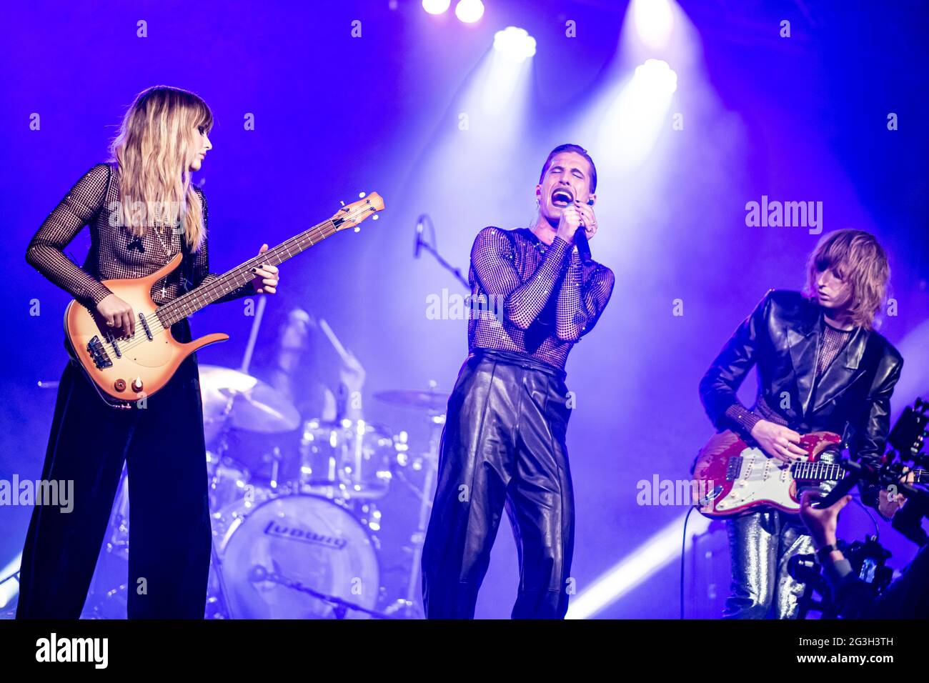 Berlin, Germany. 16th June, 2021. Victoria De Angelis (l-r), Damiano David and Thomas Raggi of the band Maneskin perform a live concert for the video portal TikTok at SchwuZ Queer Club. Credit: Fabian Sommer/dpa/Alamy Live News Stock Photo