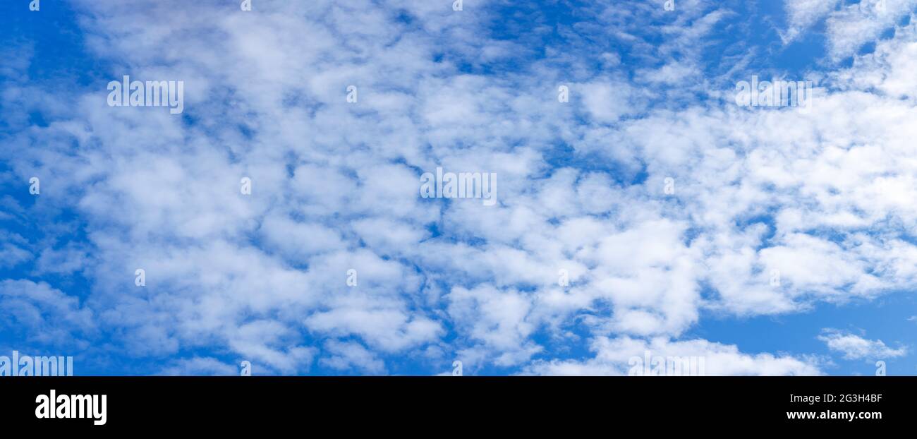 Thick white clouds in the sky Stock Photo
