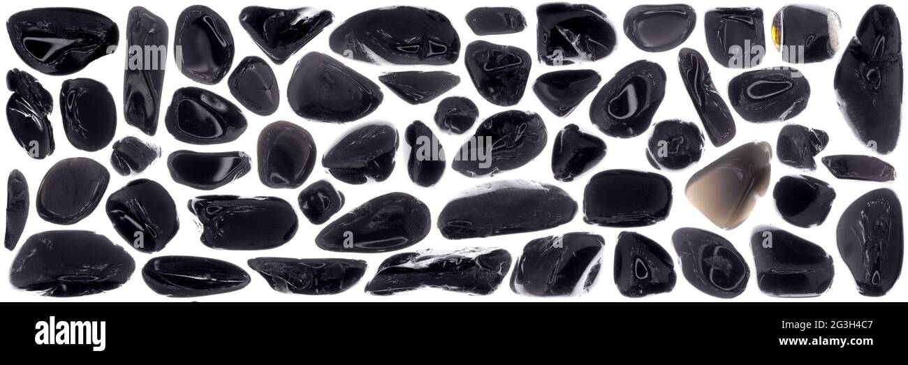Black tourmaline stones isolated set background texture Stock Photo - Alamy