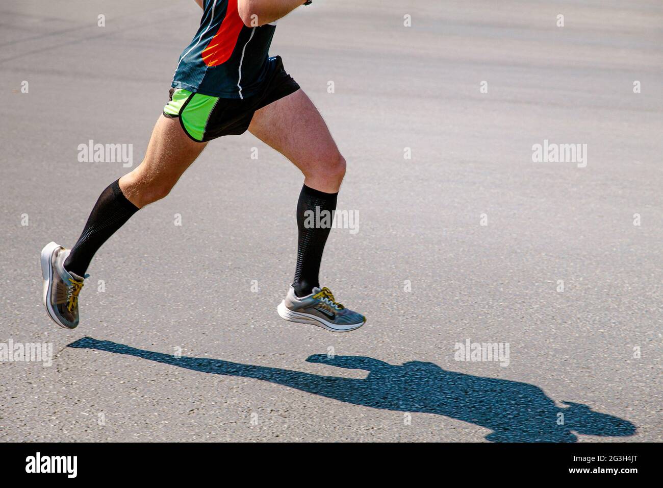 Chelyabinsk, Russia - May 30, 2021: male runner athlete running in Nike shoes in City Race Stock Photo