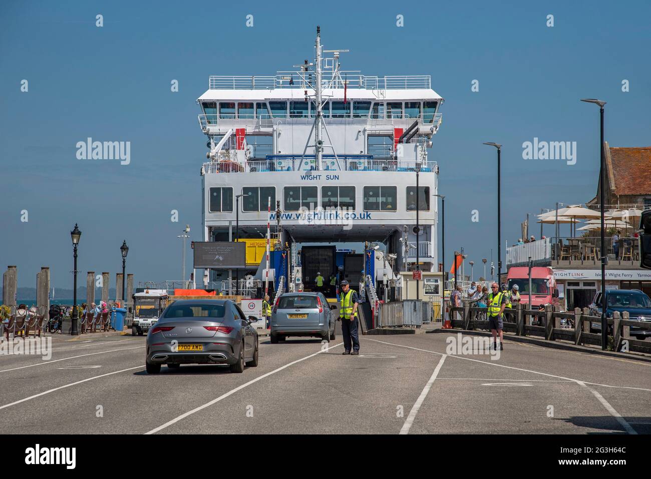 Yarmouth, Isle of Wight, England, UK. 2021. Vehicles loading onto a ro ...
