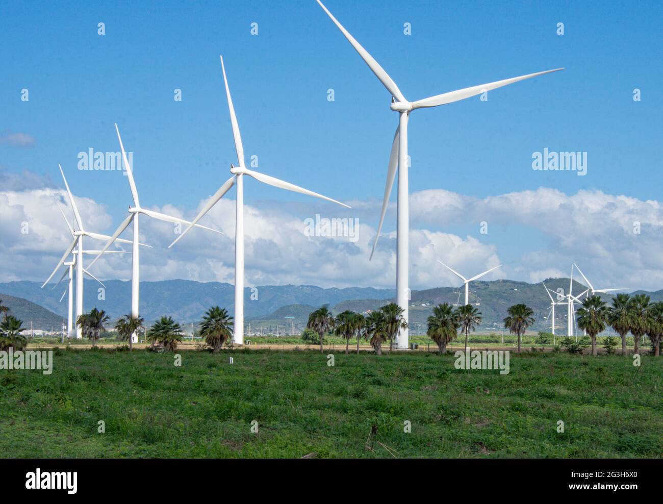 Wind turbines generating clean, renewable energy.  Copy space. Stock Photo