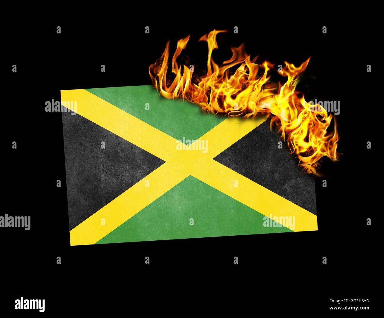 Flag burning - Jamaica Stock Photo - Alamy