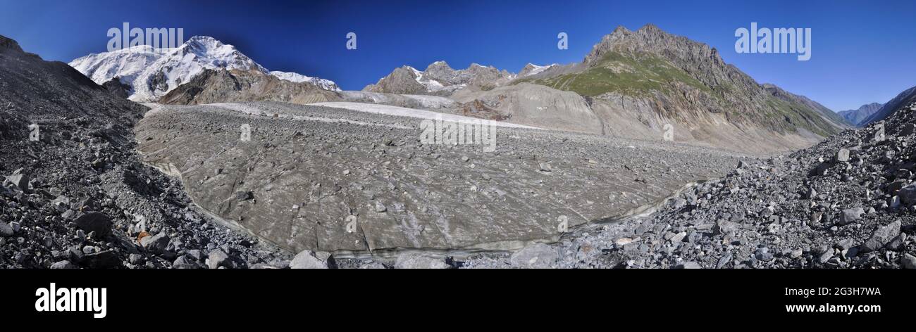 Scenic panorama of glacier and highest peaks in Tien-Shan mountain range in Kyrgyzstan Stock Photo