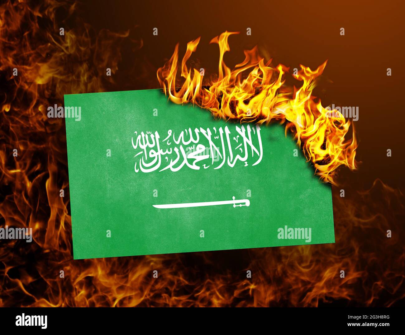 Flag burning - Saudi Arabia Stock Photo
