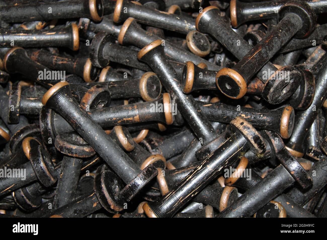 A Collection of Black Wooden Vintage Textile Bobbins Stock Photo Alamy